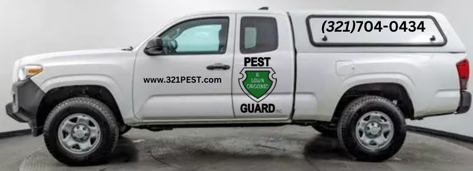 A white pickup truck with a pest control company logo, showcasing the company's professional appearance and commitment to service.