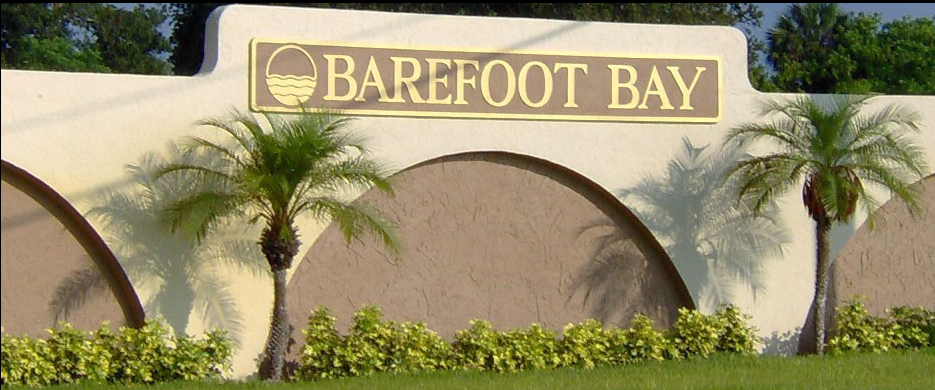 The welcome sign for Barefoot Bay, Florida.. Termite Control Barefoot Bay