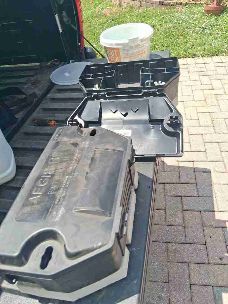 Closed black Aegis-RP rodent bait station.