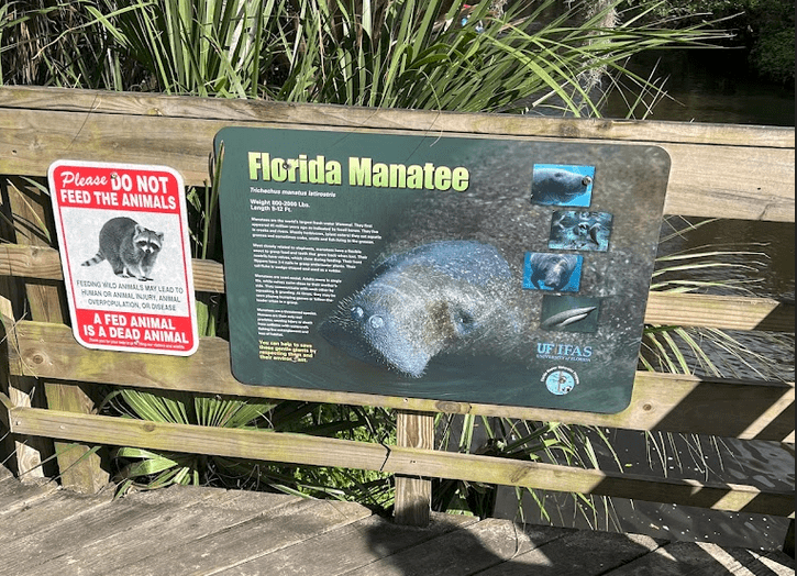 Termite Control Palm Bay, Sign about Florida Manatees along Turkey Creek in Palm Bay.