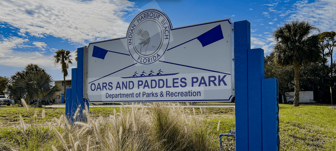 Sign for Oars and Paddles Park in Indian Harbour Beach.